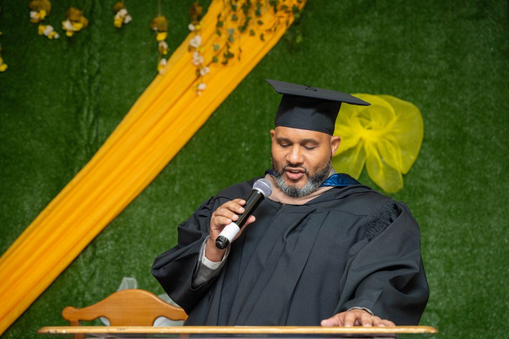 A speaker addressing a BTCC graduation ceremony