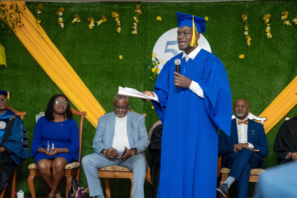 A graduate speaking at the ceremony