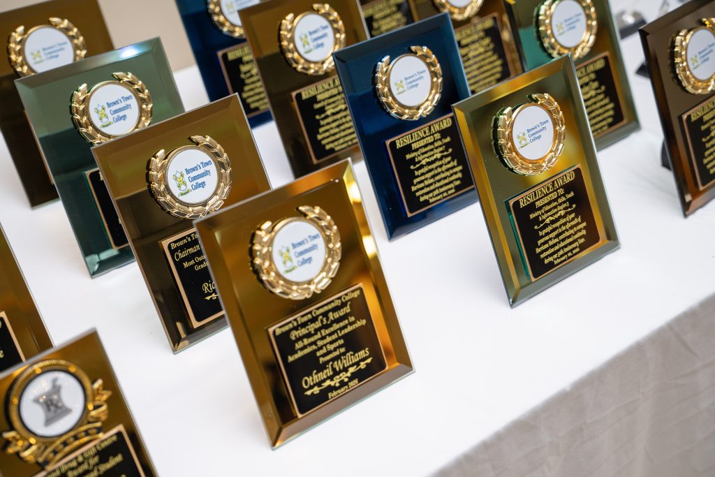 Graduation award plaques arranged for presentation